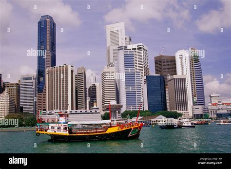 Tour boats and skyline, Singapore Stock Photo - Alamy