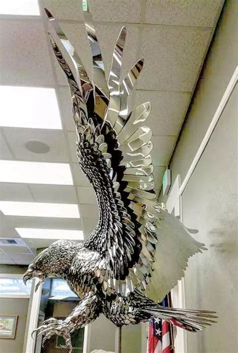 Life size polished stainless steel eagle sculpture that I created for ...