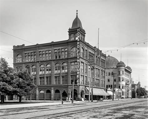 an old black and white photo of a building