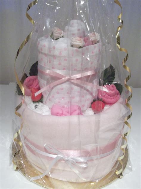 New baby girl nappy cake. | New baby products, New baby gifts, Baby nappy cakes