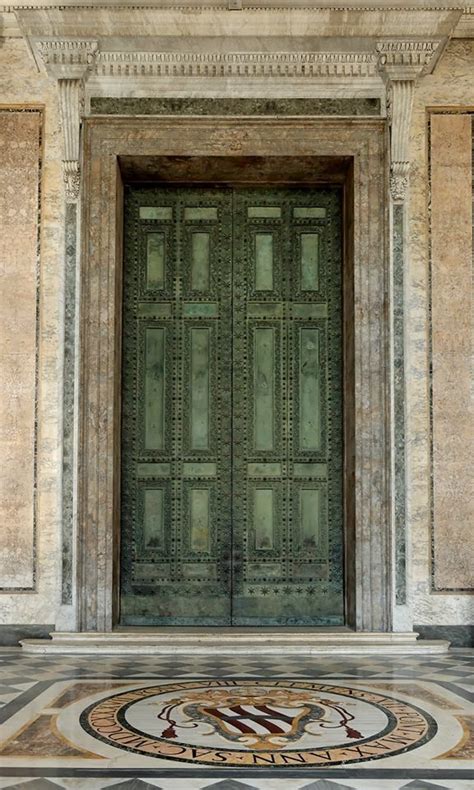 Ancient Roman doors from the Curia Julia, moved in 1660 to become the main door of the Basilica ...