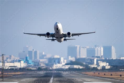 Boeing 737-800 taking off Stock Photo | Adobe Stock