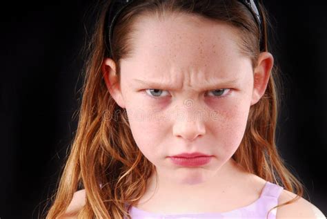 Young Girl Looking Angry stock photo. Image of emotion - 4997968