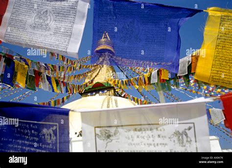 Prayer flags and view of the "all-seeing eyes of the Buddha, " Bodnath, Nepal, Asia Stock Photo ...