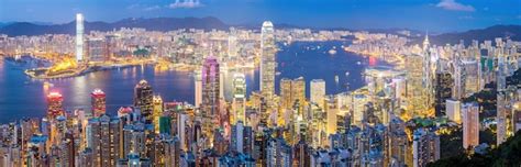 Premium Photo | Hong kong skyline at dusk panorama