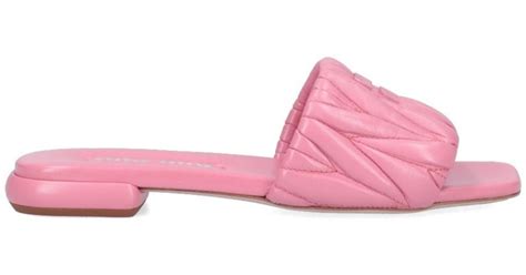 Miu Miu Logo Slides in Pink | Lyst