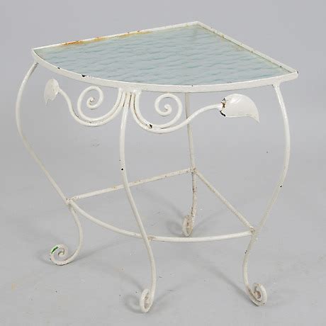 CORNER TABLE, raw glass top with white painted wrought iron stand ...