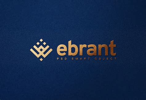 Maquete do logotipo dourado de luxo em papel azul | PSD Premium