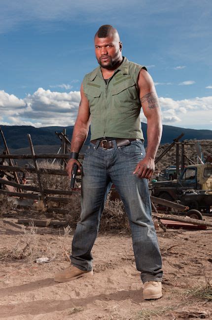 Quinton “Rampage” Jackson looks tough in a combat-style top and jeans ...