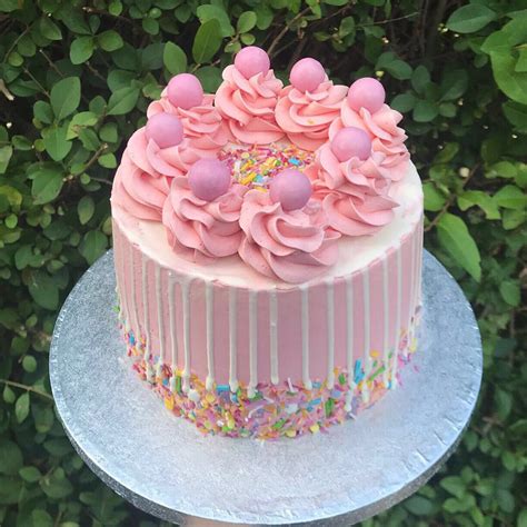 Pale pink vanilla cake with unicorn sprinkles with icecream swirls ...