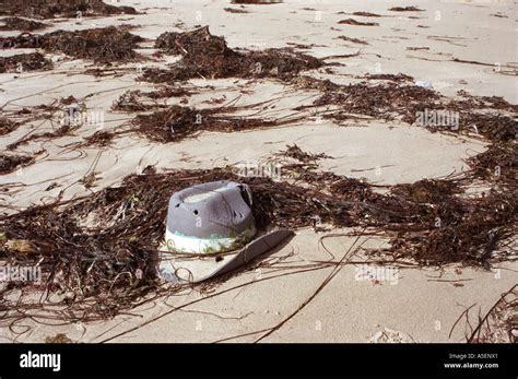 hat on beach Stock Photo - Alamy