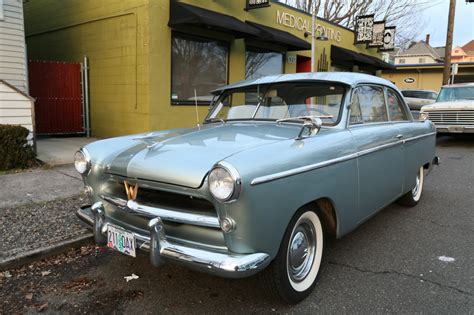 OLD PARKED CARS.: 1952 Willys Aero Lark.