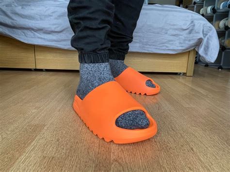 Yeezy Slides 'Enflame Orange' - SneakerCool.com