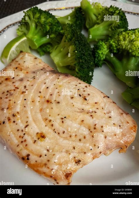 Close up of a broiled swordfish steak and broccoli, 2024, United States Stock Photo - Alamy