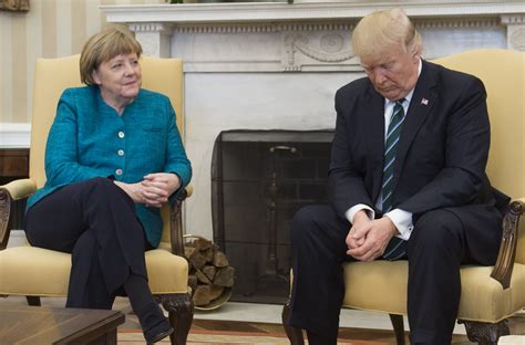 Trump seems to ignore requests for handshake with Merkel in the Oval Office