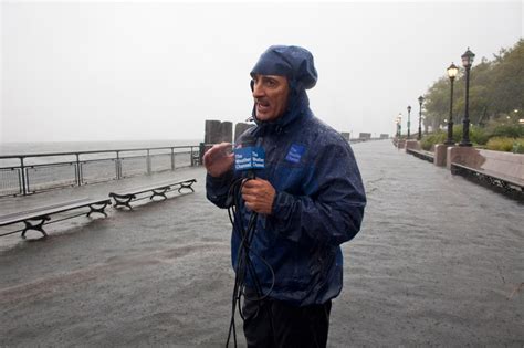 The Weather Channel's Jim Cantore struck by tree live on air