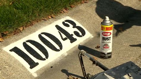 House numbers on the curb made with reflective paint could help in emergencies | WSBT