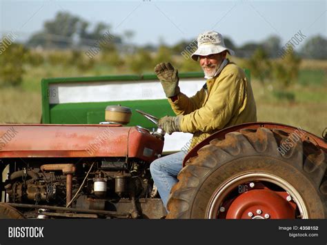 Happy Farmer On Tractor Image & Photo | Bigstock