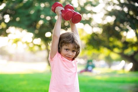 Kids Sport Exercising in Park. Children Healthy Lifestyle. Sport Child ...