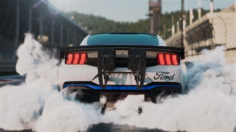 Download Smoky Ford Mustang Drag Racing Car Wallpaper | Wallpapers.com