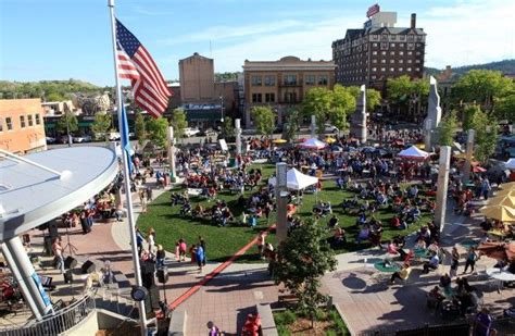 Summer Nights attendees gather in Main Street Square in downtown Rapid City for the annual ...