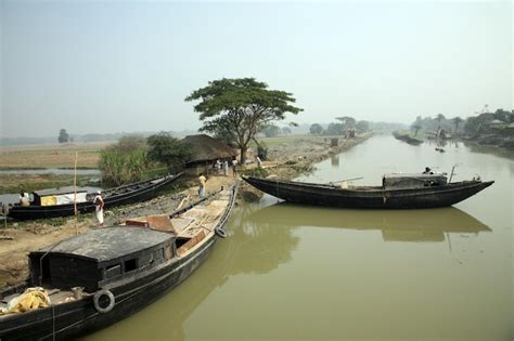 Premium Photo | Traditional fishing boat in the delta of the ganges ...