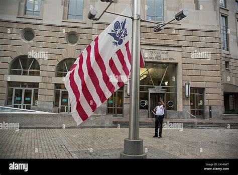 100312: Washington DC - The CBP flag is raised to half-staff at the ...