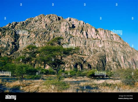 Late afternoon light on the Tsodilo Hills in Botswana, famous for the Stock Photo: 67969596 - Alamy