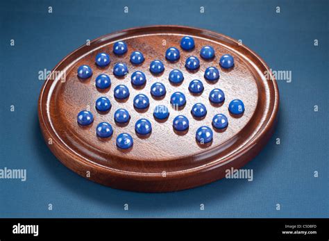 One of several game variations for Marbles Stock Photo - Alamy