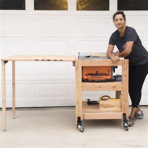 Love this! Learn how to make a DIY table saw stand with a folding outfeed table. This simple ...