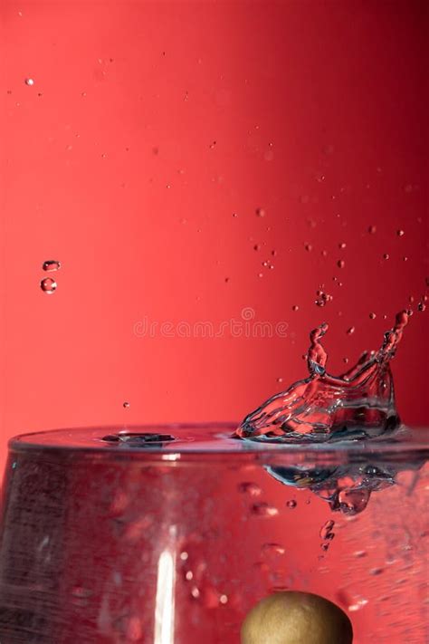 Water Splash Isolated On Red Background Stock Photo - Image of motion, abstract: 152241442