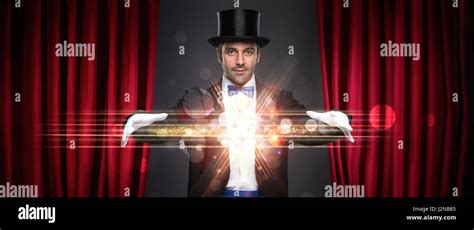 magician showing trick on stage, magic, performance, circus, show concept Stock Photo - Alamy