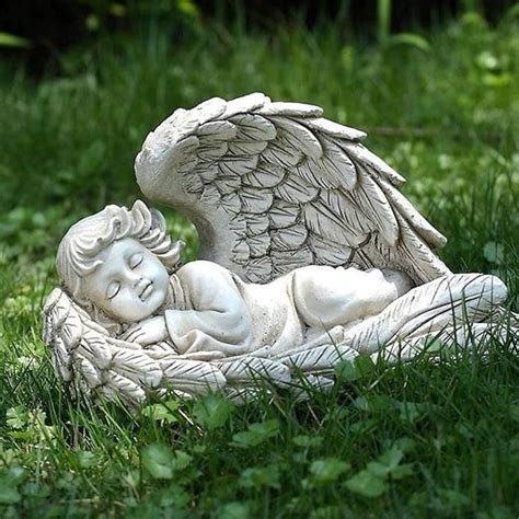 sleeping baby wrapped in angel wings statue for sale