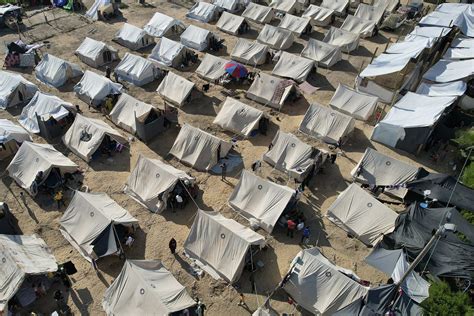 Reawakening old traumas: Squalid tent camp in southern Gaza takes in ...