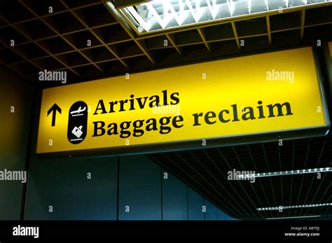 Arrivals, Baggage Reclaim sign Heathrow airport uk Stock Photo - Alamy