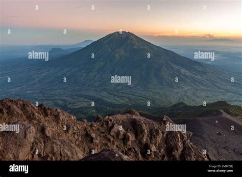 View to green Merbabu volcano from Merapi mountain. Java island. Indonesia Stock Photo - Alamy