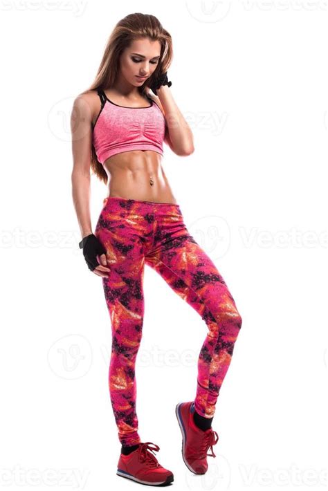 Beautiful fitness girl wearing pink outfit in studio 16112631 Stock ...