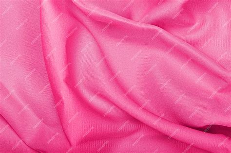 Premium Photo | Pink silk fabric texture background