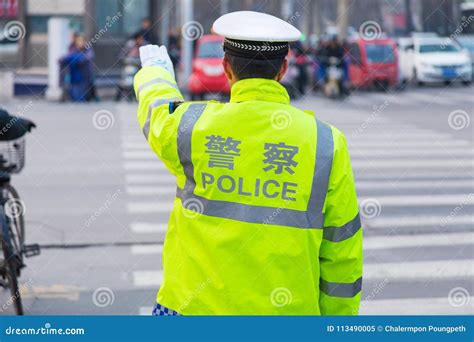 Chinese Policeman In Beijing Editorial Image | CartoonDealer.com #53153086