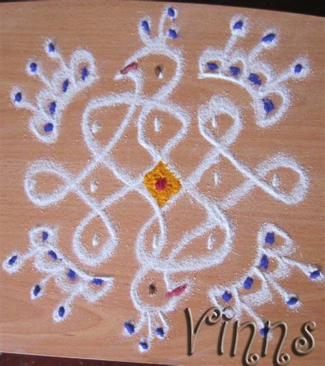 A small sikku kolam turned out to be birdie (With images) | Kolam designs, Rangoli designs ...