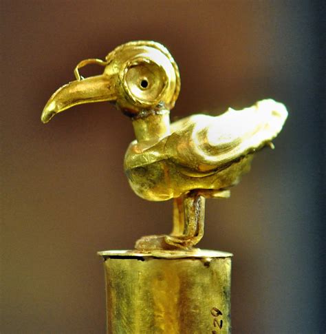 Golden bird, a typically found symbol on objects from the … | Flickr