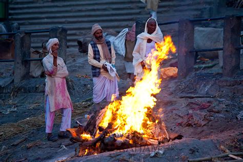 Body Burns on Funeral Pyre at Hindu Cremation by River Ganges | TIM ...