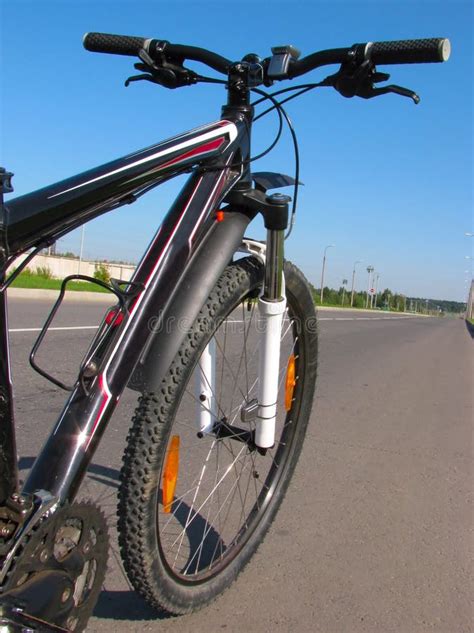 Mountain bike on a road stock photo. Image of gear, exercising - 11153040