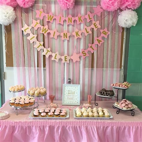 The centre of the party room: a pink and gold themed sweet table and ...