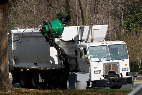 Sanitation Worker Truck Stock Photos, Pictures & Royalty-Free Images ...