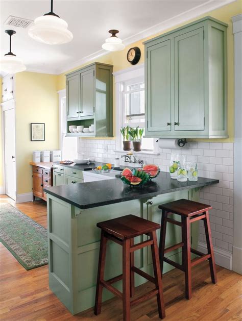 Editors' Picks: Our Favorite Green Kitchens | Yellow kitchen walls, Green kitchen cabinets ...