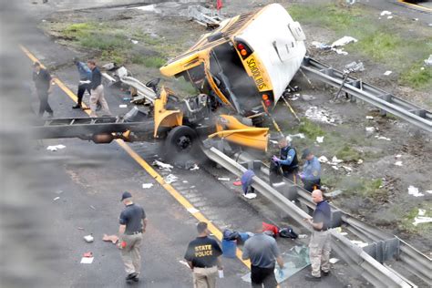 Investigators probe cause of school bus crash that killed 2 | PBS NewsHour