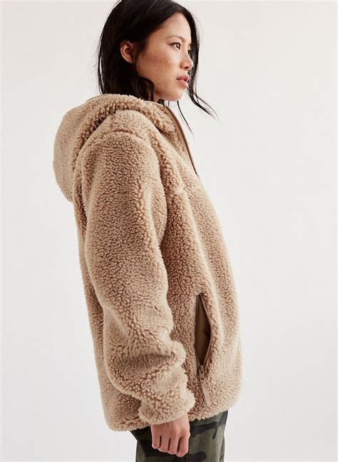 Officially one of the coziest jackets you'll own, this hoodie is made with soft vegan sherpa ...