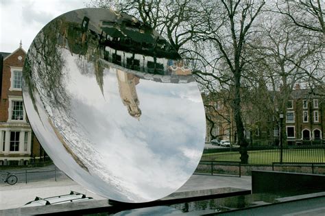 Nottingham Playhouse and Roman Catholic Cathedral reflected in Anish Kapoor's Sky Mirror in ...