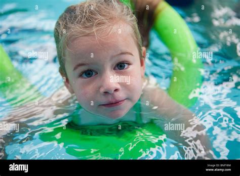 Person in a inflatable tube in a swimming pool hi-res stock photography and images - Alamy